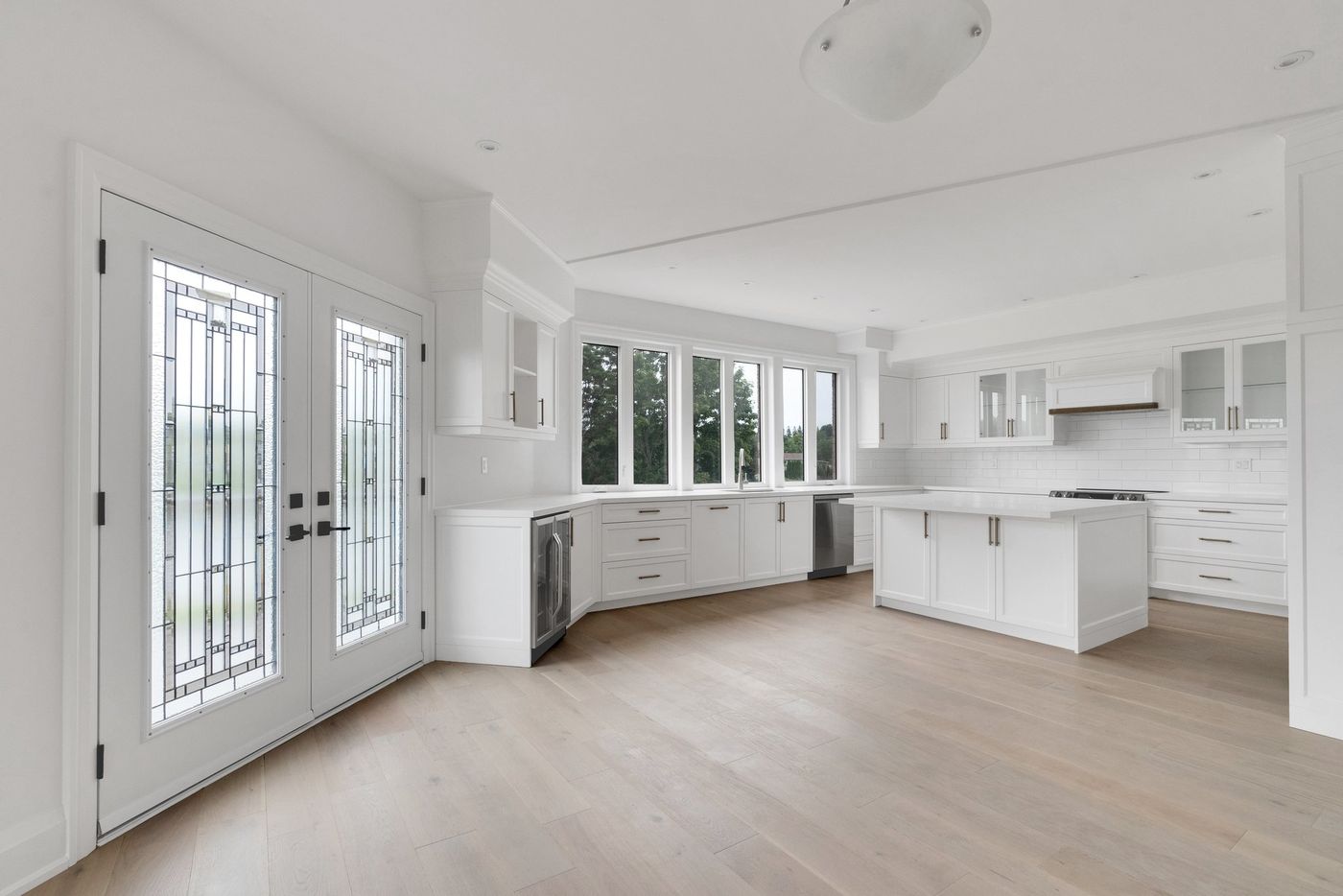 Kitchen with island and leaded-glass garden doors